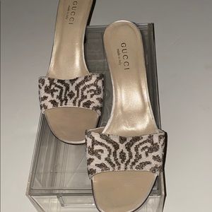 Slides of the Gucci kind